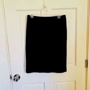 DKNY wool black pencil skirt size 4 zip closure over knee slit in the back